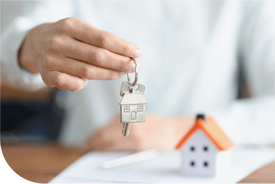 homeowner handing keys to tenant